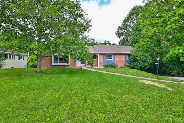 1885 Forest View Ct, Green Twp, OH 45233 - single story home with brick siding and a front lawn