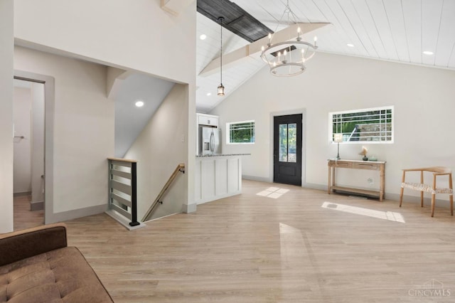 797 Fourth St, Reading, OH 45215 - entrance foyer with light wood-style floors, a chandelier, high vaulted ceiling, baseboards, and recessed lighting