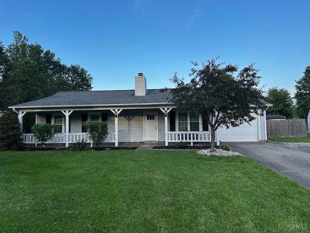 3914 Brookville Dr, Batavia Twp, OH 45102 - view of front of home featuring a porch, an attached garage, driveway, and a chimney