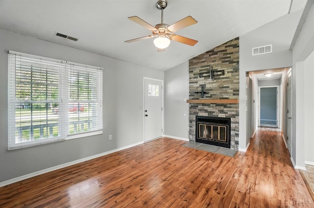 3914 Brookville Dr, Batavia Twp, OH 45102 - unfurnished living room with wood finished floors, plenty of natural light, a ceiling fan, and high vaulted ceiling