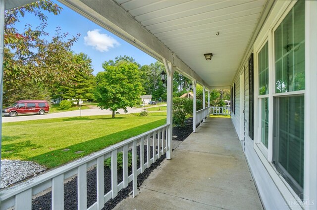 3914 Brookville Dr, Batavia Twp, OH 45102 - covered porch featuring a yard