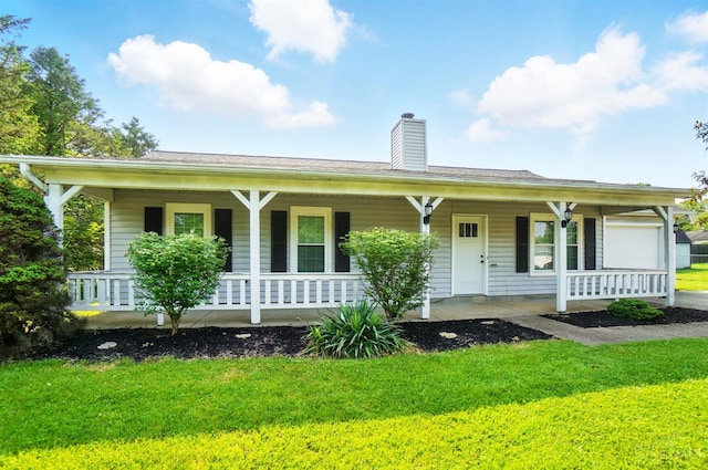 3914 Brookville Dr, Batavia Twp, OH 45102 - view of front of property with a porch, a front yard, and a chimney