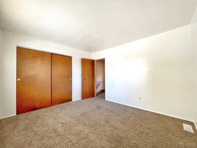 3610 Roosevelt Blvd Unit B, Middletown, OH 45044 - unfurnished bedroom featuring carpet floors, a closet, and baseboards