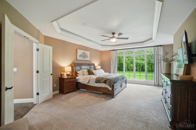 7757 Misty Meadows Ct, Harlan Twp, OH 45152 - bedroom featuring a raised ceiling, light colored carpet, baseboards, and a ceiling fan