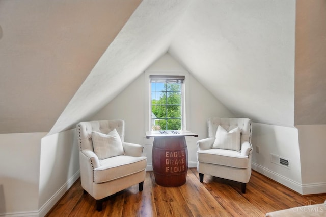 7757 Misty Meadows Ct, Harlan Twp, OH 45152 - sitting room with wood finished floors, vaulted ceiling, and baseboards
