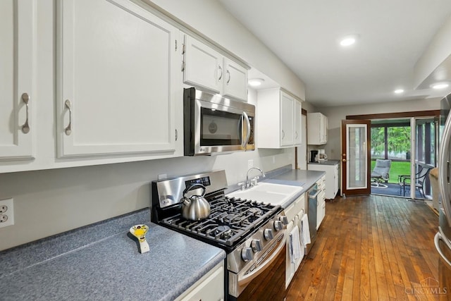 21 Garden Cir, Wilmington, OH 45177 - kitchen featuring stainless steel appliances, a sink, white cabinetry, recessed lighting, and dark wood-type flooring