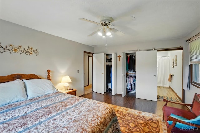 21 Garden Cir, Wilmington, OH 45177 - bedroom featuring multiple closets, wood finished floors, ceiling fan, and baseboards