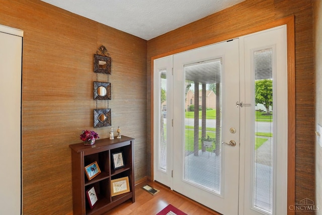 21 Garden Cir, Wilmington, OH 45177 - entryway with wood finished floors and a textured ceiling