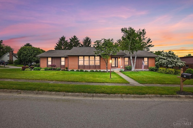 21 Garden Cir, Wilmington, OH 45177 - ranch-style house featuring a front yard