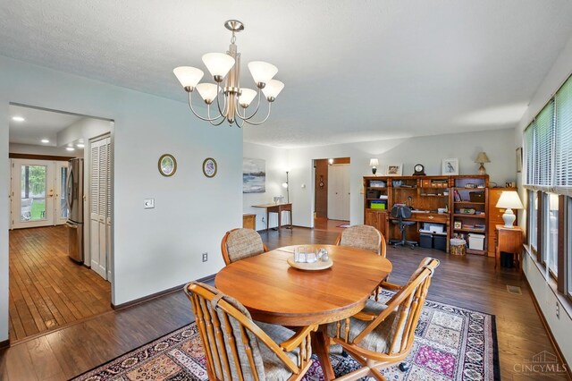 21 Garden Cir, Wilmington, OH 45177 - dining room with wood finished floors and a chandelier