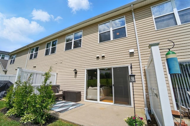 943 Steamboat Dr Unit 204, Union Twp, OH 45244 - rear view of house with a patio