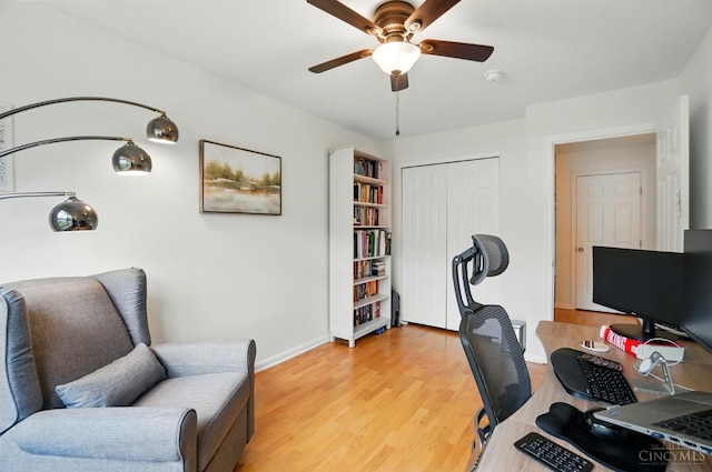 943 Steamboat Dr Unit 204, Union Twp, OH 45244 - home office featuring a ceiling fan, light wood-style floors, and baseboards