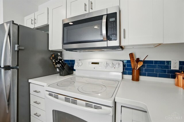 943 Steamboat Dr Unit 204, Union Twp, OH 45244 - kitchen featuring stainless steel appliances, white cabinets, and light countertops
