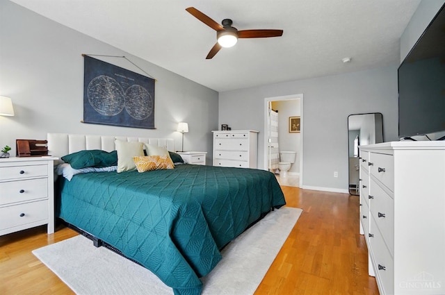 943 Steamboat Dr Unit 204, Union Twp, OH 45244 - bedroom featuring light wood-style flooring, ensuite bathroom, and a ceiling fan