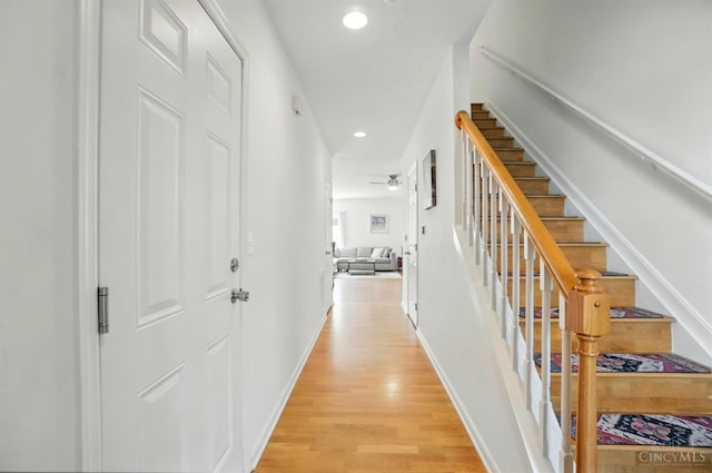 943 Steamboat Dr Unit 204, Union Twp, OH 45244 - hallway with light wood-style floors, recessed lighting, stairway, and baseboards