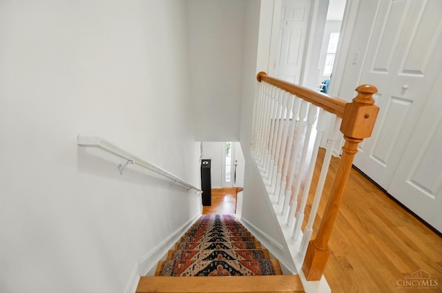 943 Steamboat Dr Unit 204, Union Twp, OH 45244 - staircase with baseboards and wood finished floors