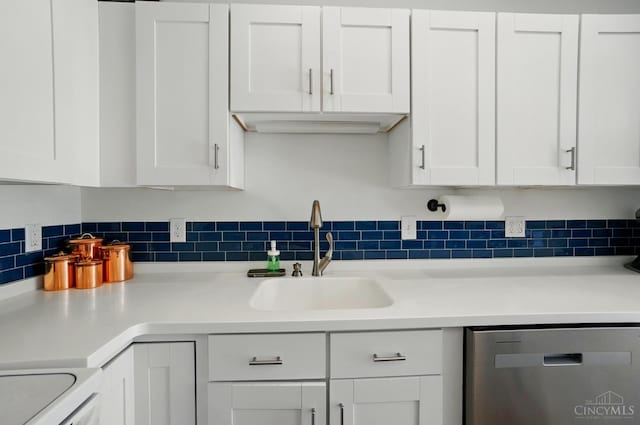 943 Steamboat Dr Unit 204, Union Twp, OH 45244 - kitchen with dishwasher, a sink, white cabinetry, and backsplash