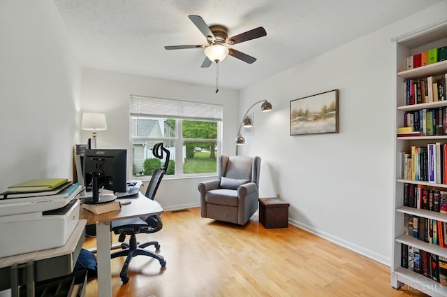943 Steamboat Dr Unit 204, Union Twp, OH 45244 - office space with a ceiling fan, wood finished floors, and baseboards