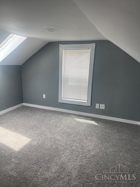 4 Cottage Ct, Anderson Twp, OH 45230 - bonus room with lofted ceiling, carpet floors, baseboards, and a skylight