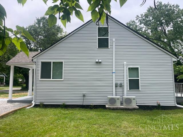 4 Cottage Ct, Anderson Twp, OH 45230 - rear view of property featuring a lawn and ac unit