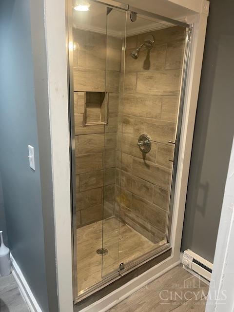 4 Cottage Ct, Anderson Twp, OH 45230 - full bath with baseboard heating, a shower stall, and baseboards