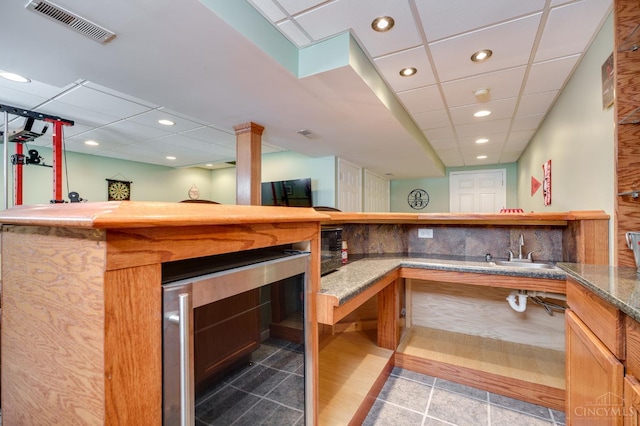 1240 Carriage Hill Ln, Hamilton, OH 45013 - indoor wet bar with recessed lighting, wine cooler, tile patterned floors, and a drop ceiling