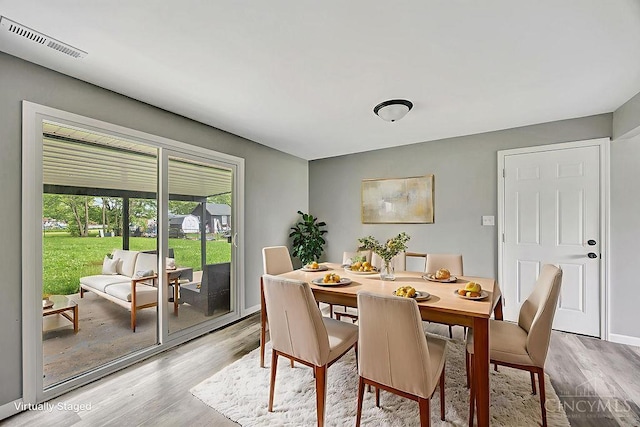 8486 US Route 127, West Manchester, OH 45382 - dining area featuring light wood finished floors and baseboards