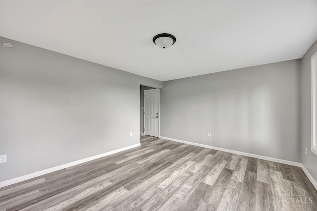 8486 US Route 127, West Manchester, OH 45382 - spare room with wood finished floors and baseboards