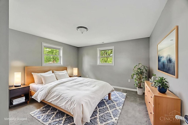 8486 US Route 127, West Manchester, OH 45382 - carpeted bedroom featuring baseboards