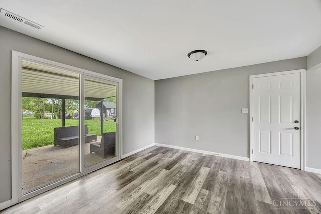 8486 US Route 127, West Manchester, OH 45382 - spare room featuring wood finished floors and baseboards