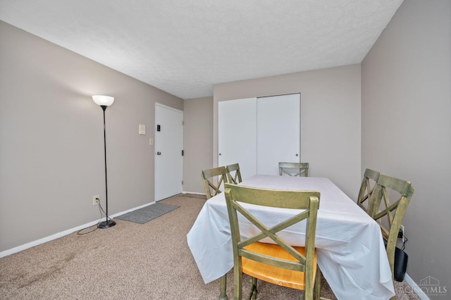 6604 Hearne Rd Unit 58, Green Twp, OH 45248 - dining area featuring light carpet and baseboards
