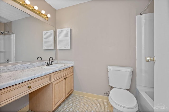 6604 Hearne Rd Unit 58, Green Twp, OH 45248 - full bathroom with vanity, toilet, tile patterned flooring, baseboards, and  shower combination