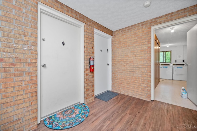 6604 Hearne Rd Unit 58, Green Twp, OH 45248 - doorway to property featuring separate washer and dryer