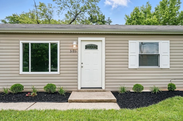 3195 Deshler, Colerain Twp, OH 45251 - view of exterior entry with roof with shingles