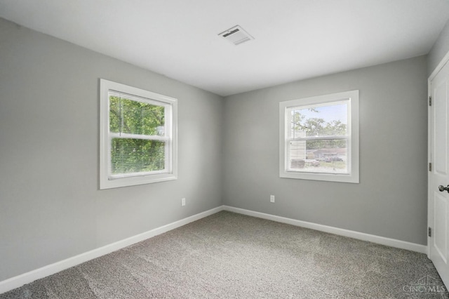 3195 Deshler, Colerain Twp, OH 45251 - spare room with plenty of natural light, carpet floors, and baseboards