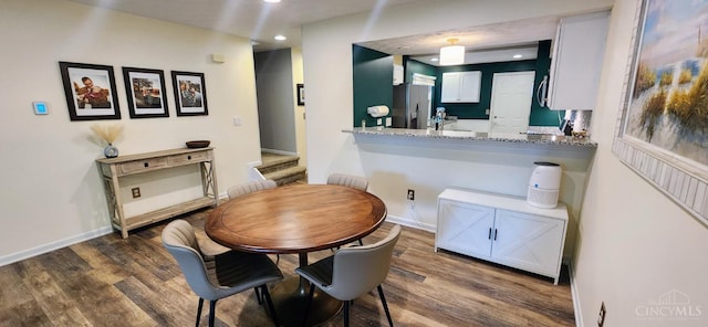 7638 Lake Pointe, Hamilton Twp, OH 45039 - dining area featuring wood finished floors, recessed lighting, and baseboards