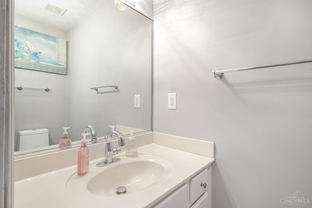 7638 Lake Pointe, Hamilton Twp, OH 45039 - bathroom featuring vanity and toilet