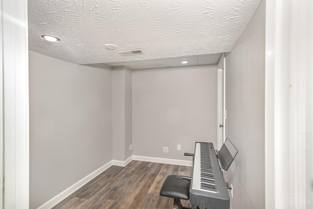 7638 Lake Pointe, Hamilton Twp, OH 45039 - exercise area featuring dark wood-style floors and baseboards