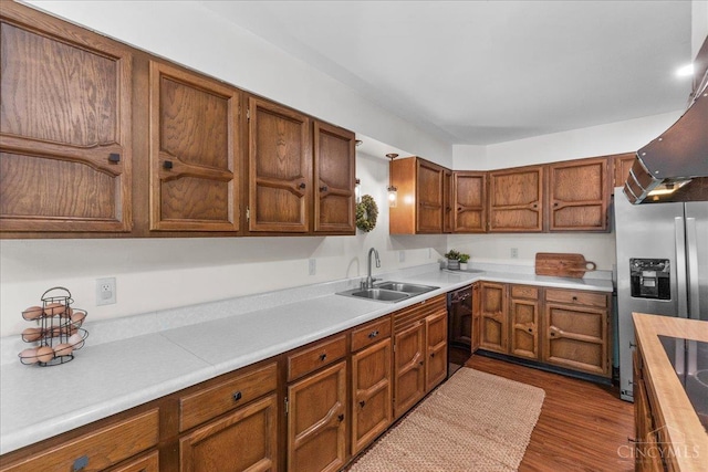 7066 Weidner Rd, Clearcreek Twp, OH 45066 - kitchen with a sink, black appliances, ventilation hood, and light countertops