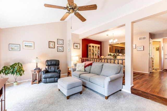 1627 Braintree Dr, Anderson Twp, OH 45255 - carpeted living area featuring ceiling fan, baseboards, a chandelier, and lofted ceiling