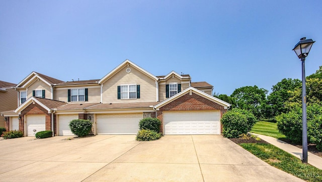 9298 Greenery Ct, Deerfield Twp, OH 45140 - multi unit property featuring brick siding and concrete driveway