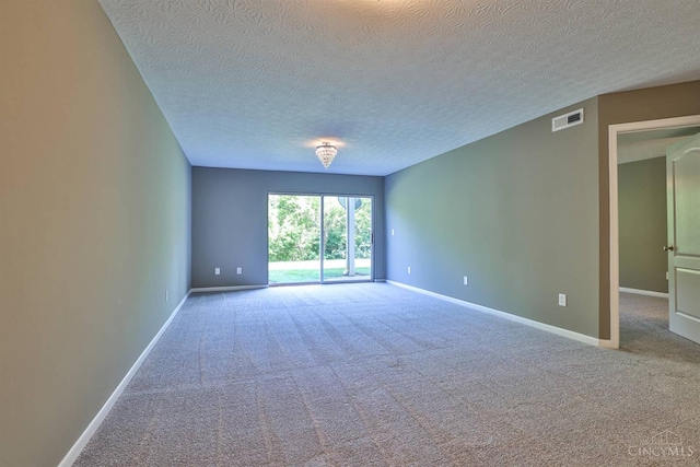 715 Castlegate Ln Unit 102, Springfield Twp, OH 45231 - carpeted spare room featuring a textured ceiling and baseboards