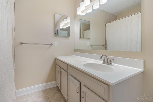 1732 Emerald Glade Ln Unit 6D, Anderson Twp, OH 45255 - bathroom featuring vanity, tile patterned flooring, and baseboards
