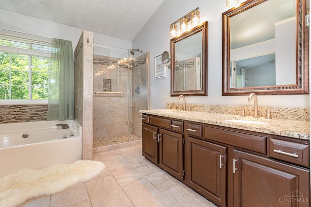 1732 Emerald Glade Ln Unit 6D, Anderson Twp, OH 45255 - bathroom featuring double vanity, a bath, and a stall shower