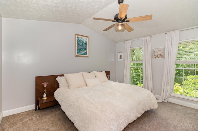 1732 Emerald Glade Ln Unit 6D, Anderson Twp, OH 45255 - bedroom with carpet, vaulted ceiling, baseboards, multiple windows, and a ceiling fan