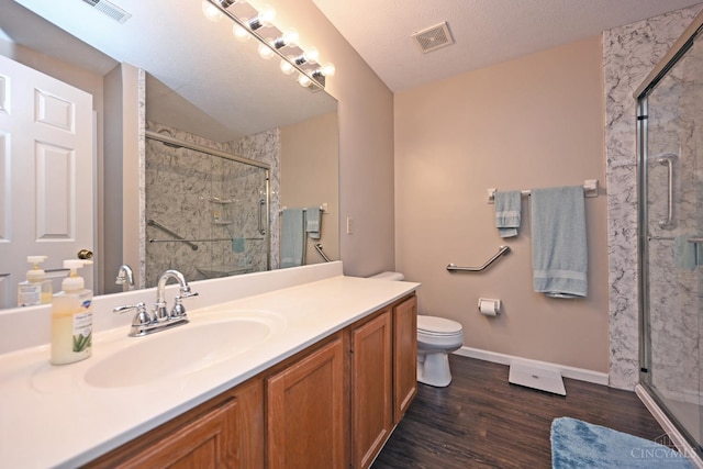 557 Hamblin Dr, Union Twp, OH 45255 - bathroom featuring a marble finish shower, vanity, toilet, and baseboards
