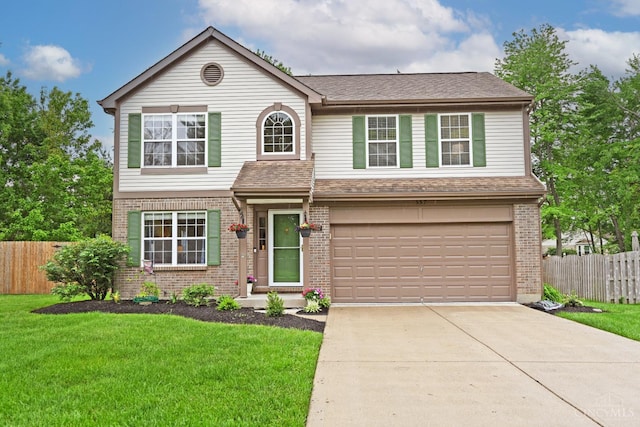 557 Hamblin Dr, Union Twp, OH 45255 - traditional home featuring brick siding, concrete driveway, and a garage