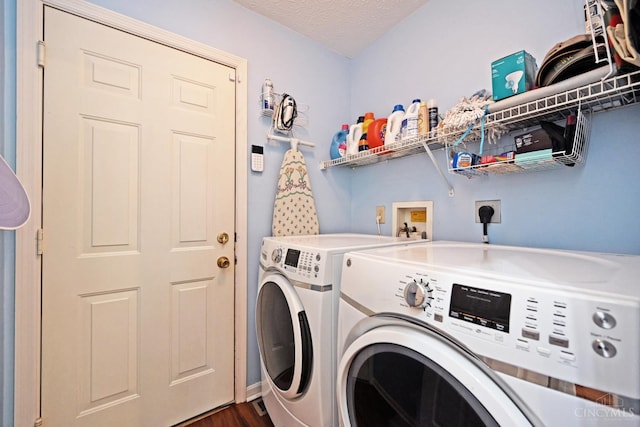 557 Hamblin Dr, Union Twp, OH 45255 - laundry area with washing machine and clothes dryer, dark wood-style flooring, and a textured ceiling