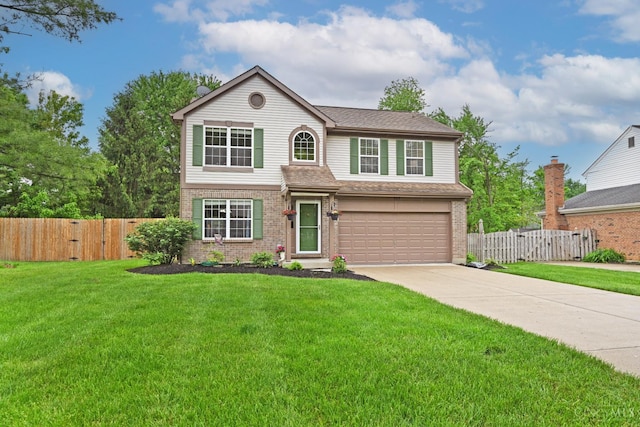 557 Hamblin Dr, Union Twp, OH 45255 - traditional-style home with a garage, brick siding, concrete driveway, and roof with shingles