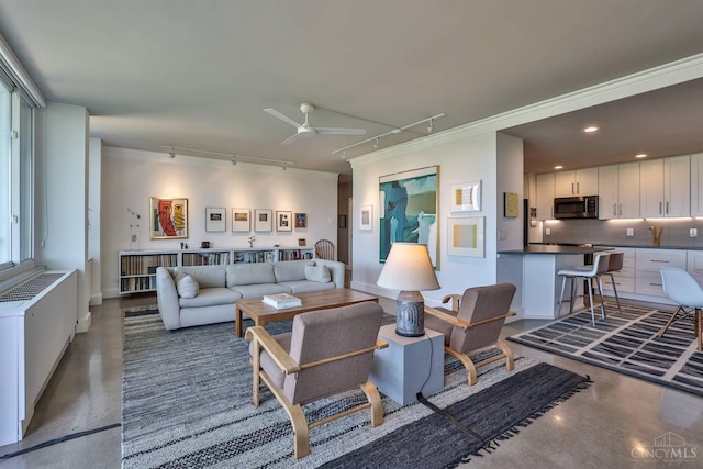 2401 Ingleside Ave Unit 10D, Cincinnati, OH 45206 - living room with track lighting, concrete flooring, and ceiling fan